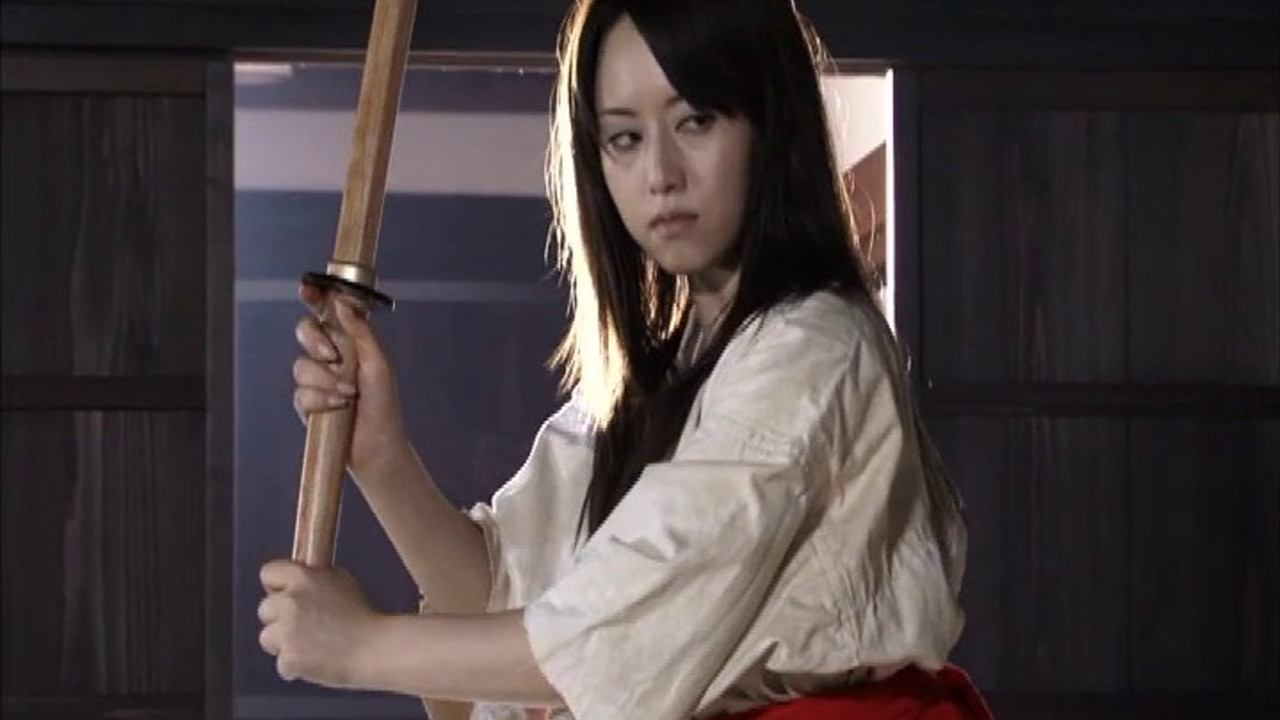 Sultry Assassin: The Aphrodisiac Kill Background