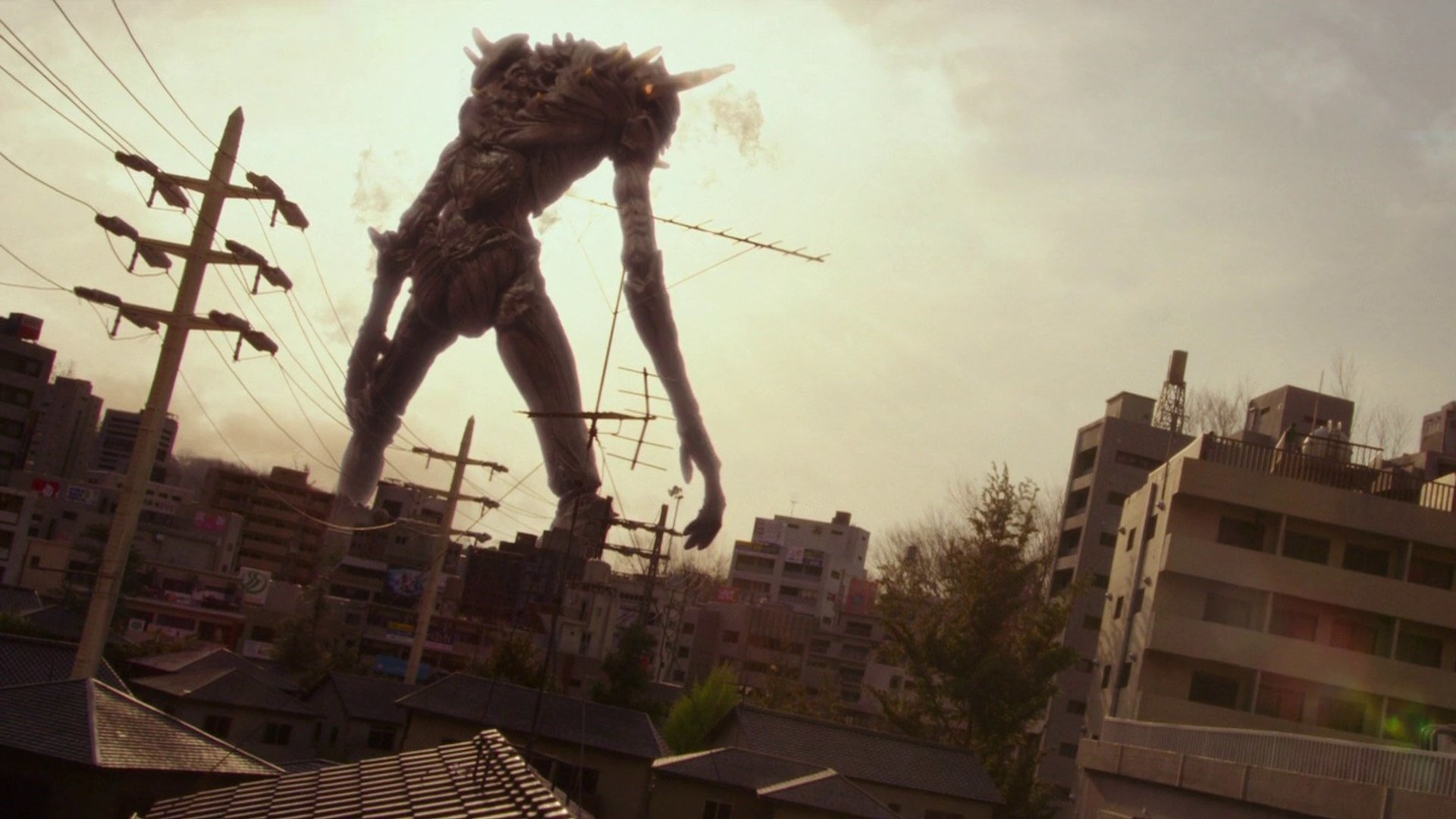 Giant God Warrior Appears in Tokyo Background