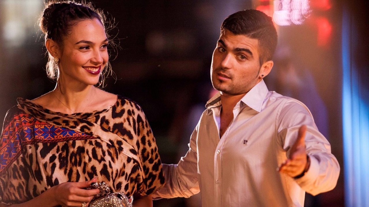 Kicking Out Shoshana Background