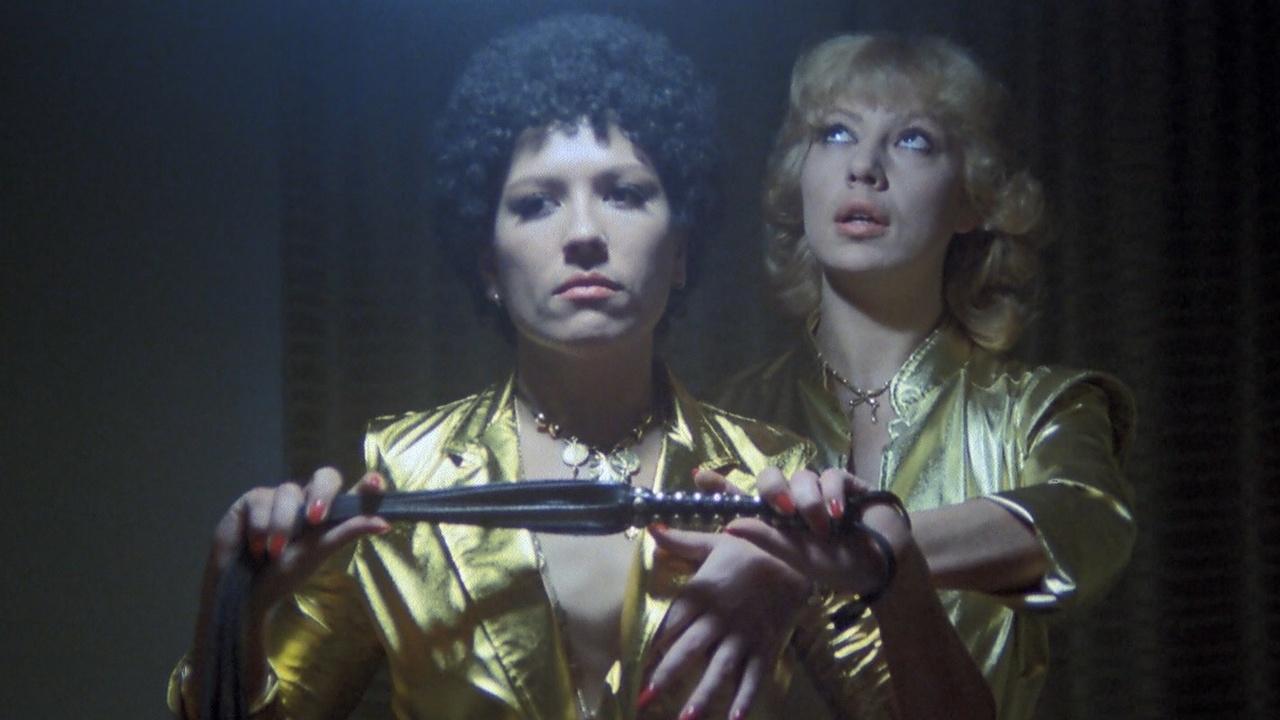 Botas negras, látigo de cuero Background