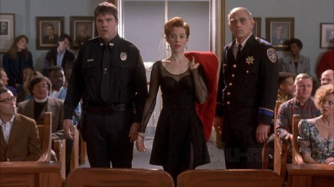 The Gun in Betty Lou's Handbag Background