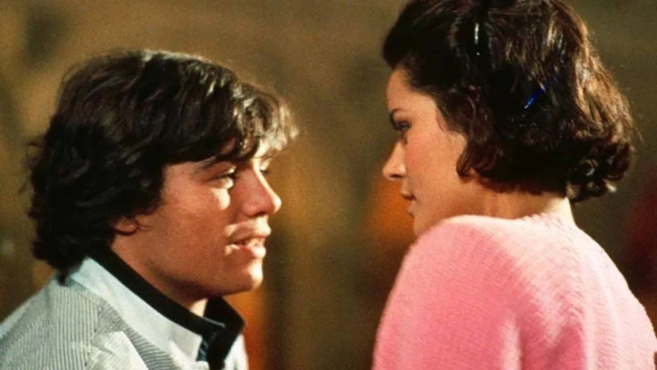 Amarsi un po'... Background