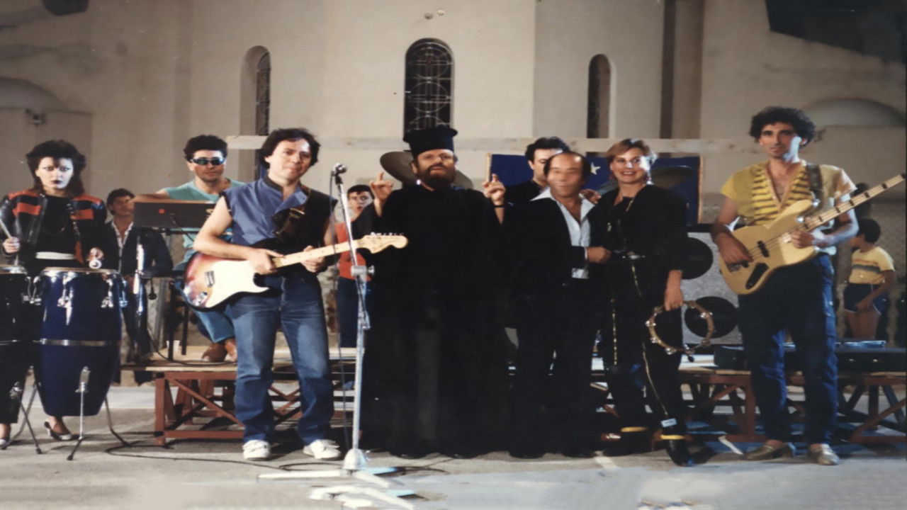 Mia papadia sta bouzoukia! Background