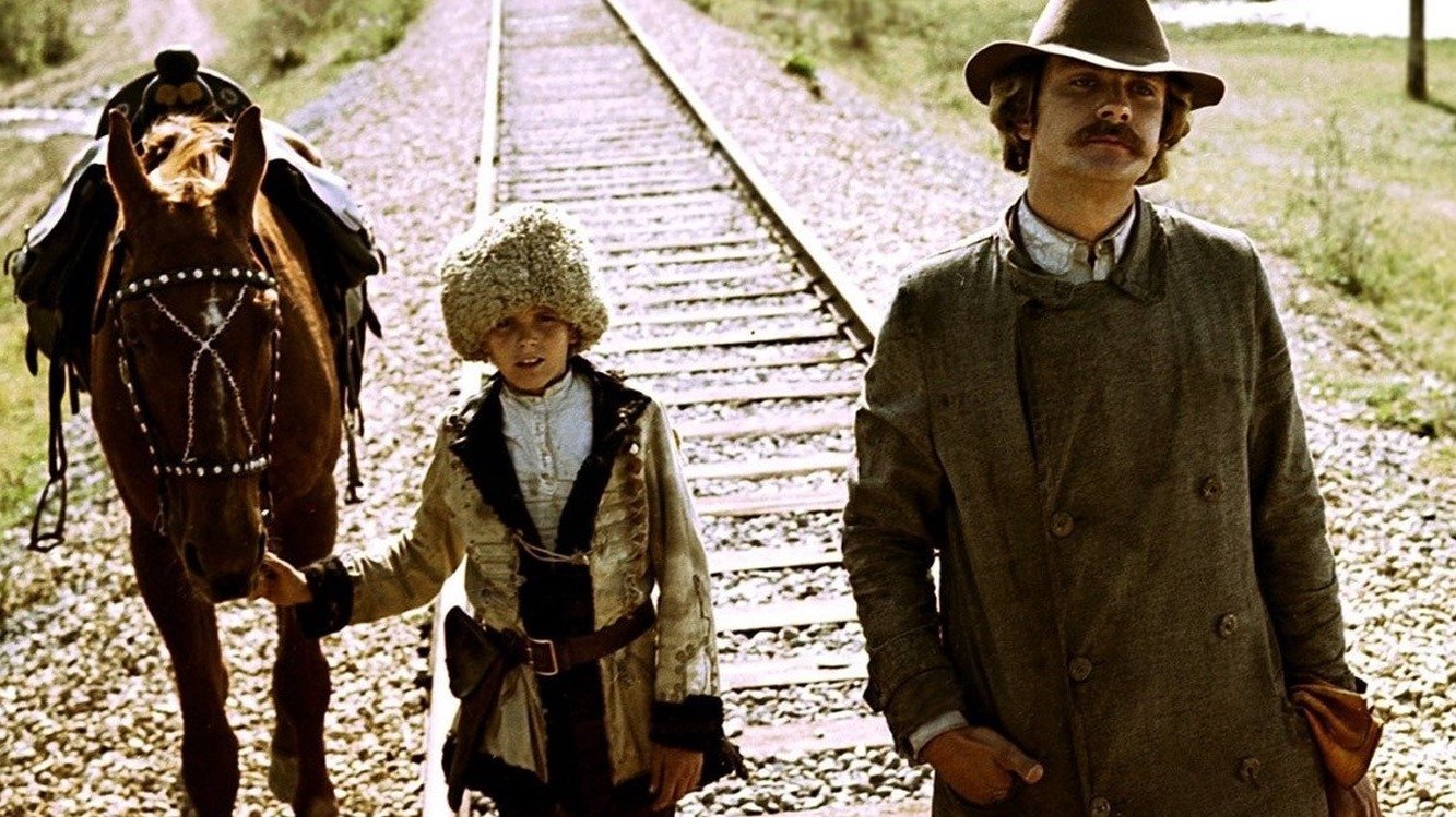 At Home Among Strangers, a Stranger Among His Own Background