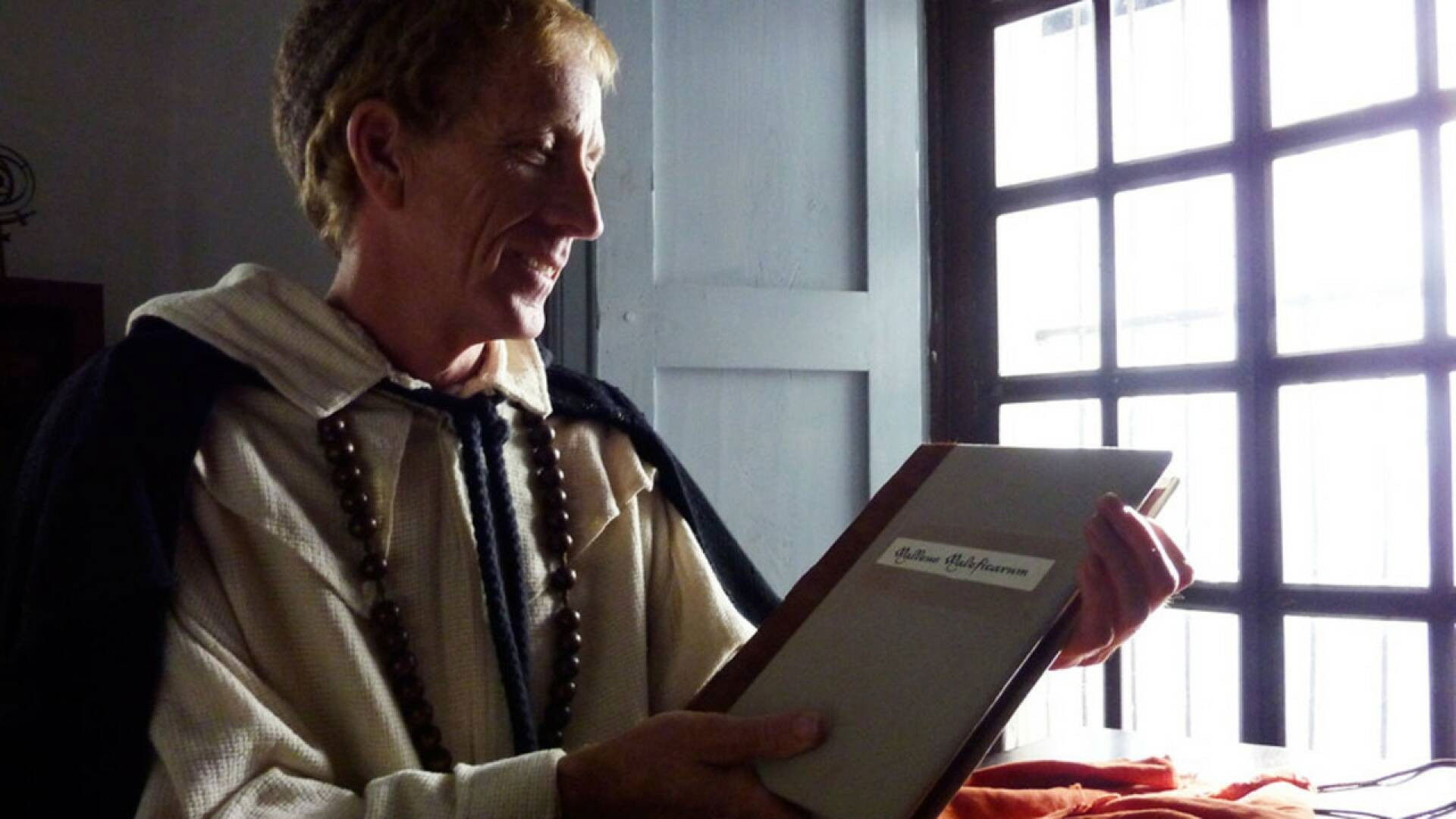 Witch Hunter's Bible Background