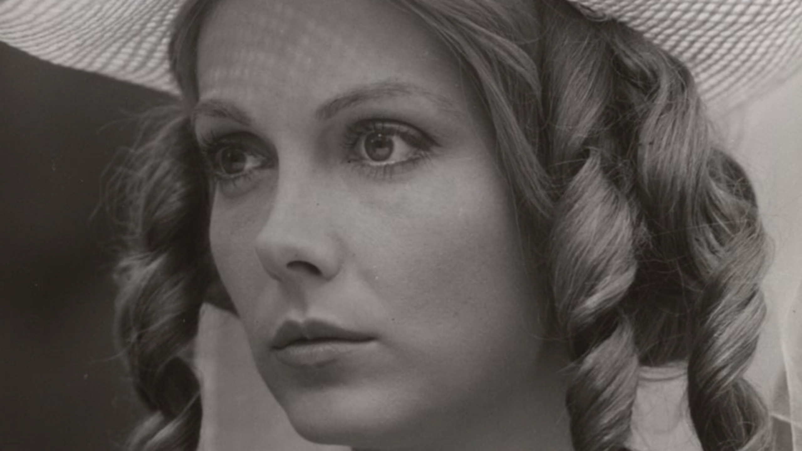 The Woman in White Background