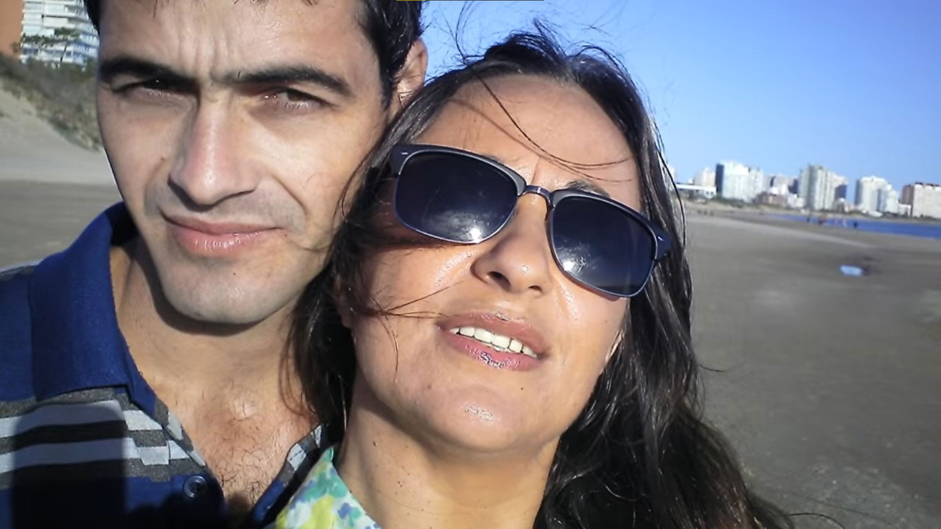 Dos palabras en la arena Background